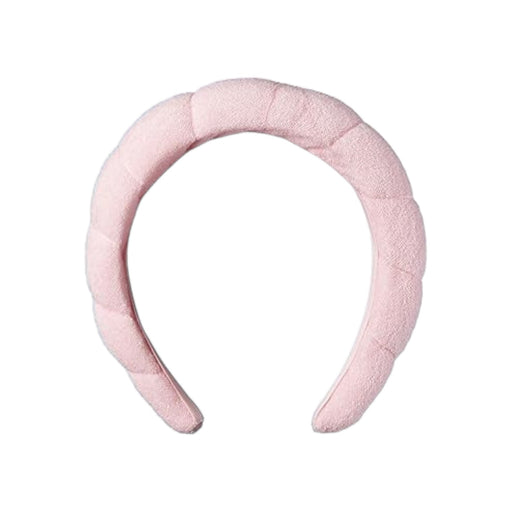 Diadema de maquillaje Conair.